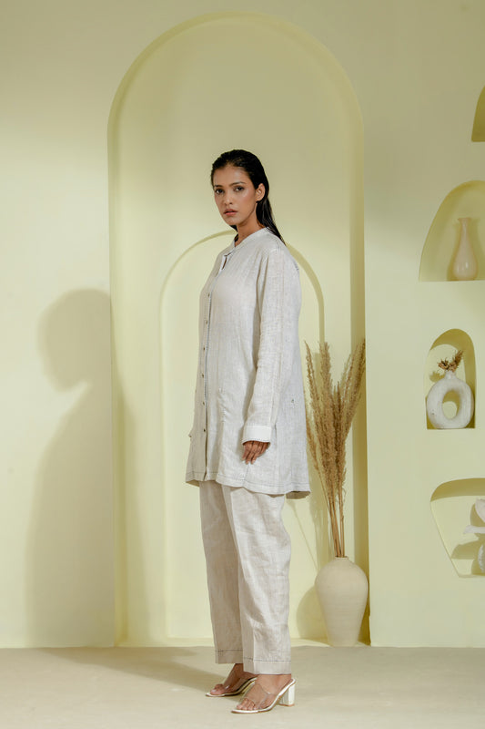 Elegant off-white A-line dress featuring a wrap-style bodice