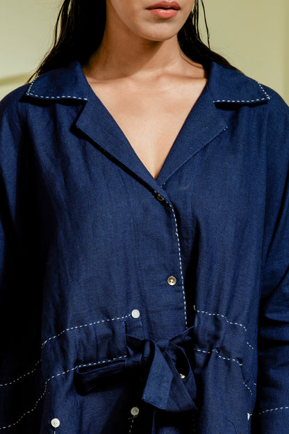 Navy co-ord set with a flared belted top