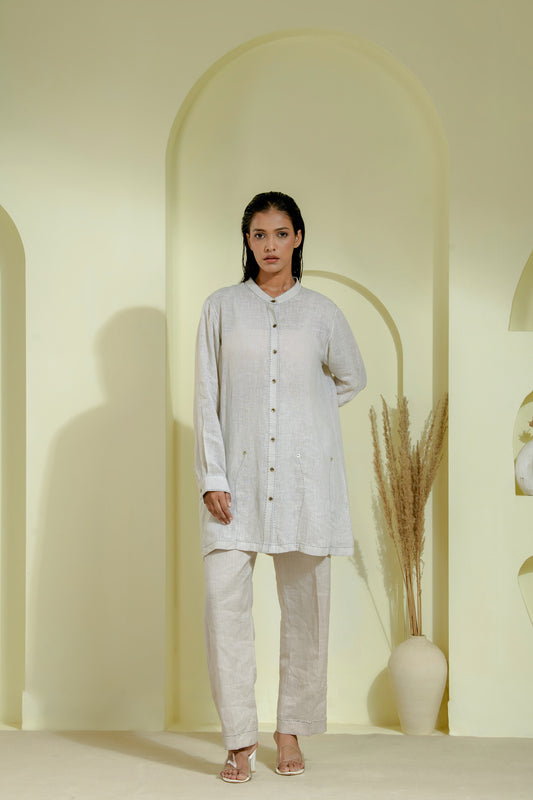 Elegant off-white A-line dress featuring a wrap-style bodice