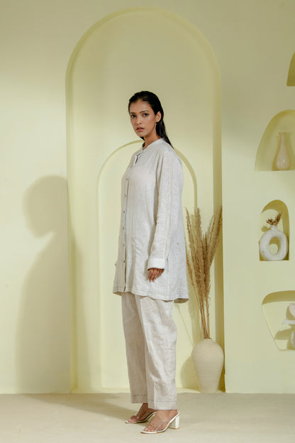 Elegant off-white A-line dress featuring a wrap-style bodice